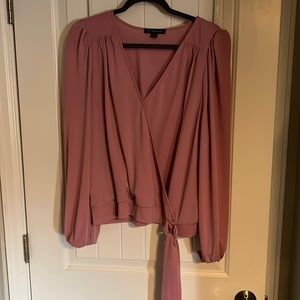 Rose colored sits at waist